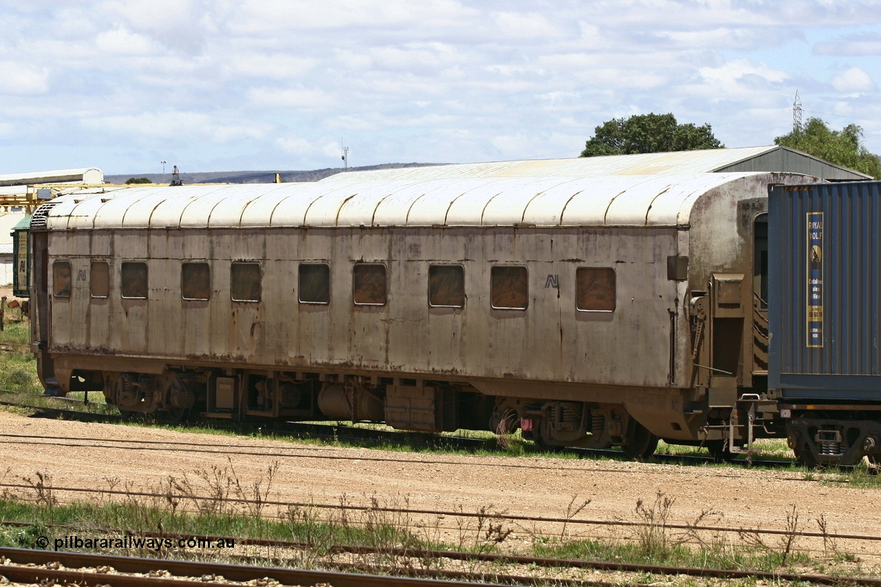 051103 6700
Spencer Junction yard, ECA 162 built by Comeng NSW in 1964 for Commonwealth Railways as a BRE type second class, air conditioned, twin berth staggered corridor steel sleeping car BRE 162. Converted to ECA type crew car in 1991. Seen here under GWA ownership on loan to Pacific National and in use on East-West freighters. Finally it was scrapped at Dry Creek in December 2014.
Keywords: ECA-type;ECA162;Comeng-NSW;BRE-type;BRE162;