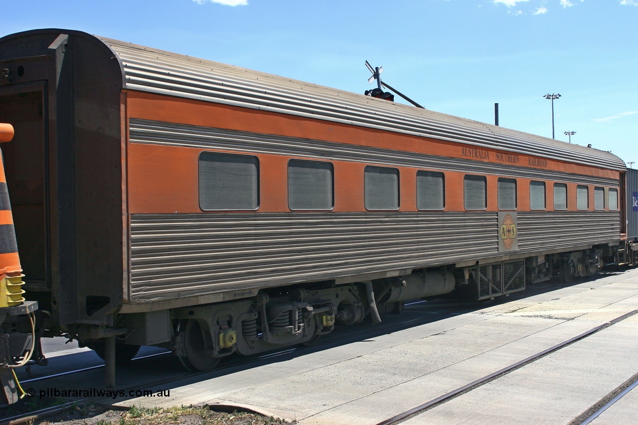 051230 1049
Melbourne, Australian Southern Railroad JTA type crew accommodation coach JTA 2, originally built in 1951 by SAR Islington Workshops as corten steel V&SAR Joint Stock twinette sleeping car Mokai for The Overland. Recoded to JTA 2 in 1987. Written off and sold in 1995. Converted to ASR crew car 1999? Converted to GWA liveried ADFY 7 in 2014.
Keywords: JTA-type;JTA2;SAR-Islington-WS;Mokai;
