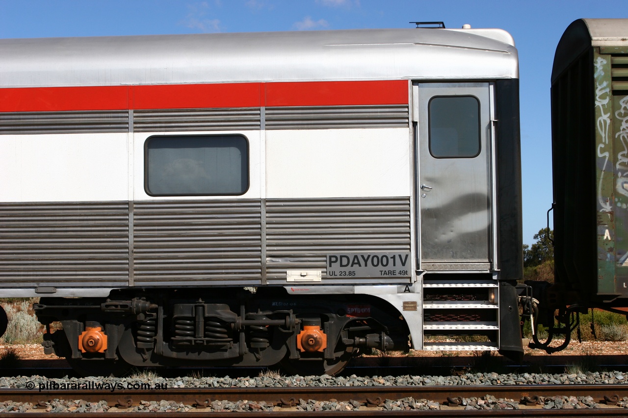 060528 4302
Golden Ridge, SCT PDAY type crew accommodation car PDAY 001 'Robert Mervin Yates', built by SAR Islington Workshops as a 250 type Bluebird second class railcar number 253 and named 'Pelican' in 1955, written off in 1995 and sold and eventually converted to a crew car by Bluebird Rail Services in 2005.
Keywords: PDAY-type;PDAY001;SAR-Islington-WS;Bluebird;250-type;