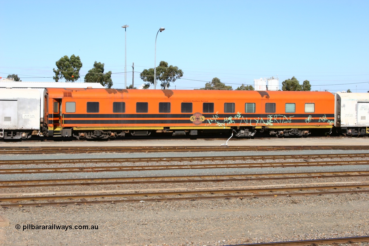 060528 4444
West Kalgoorlie, Australian Southern Railroad ECA type crew accommodation car ECA 98, originally built for the Commonwealth Railways by Wegmann & Co. in West Germany in 1955 as the ARF type first class air conditioned sleeper with rounded observation end ARF 98, rebuilt and recoded in 1972 without the observation end as BB type BB 98. Converted to a crew car in 1991.
Keywords: ECA-type;ECA98;Wegmann-&-Co-West-Germany;ARF-type;ARF98;BB-type;BB98;