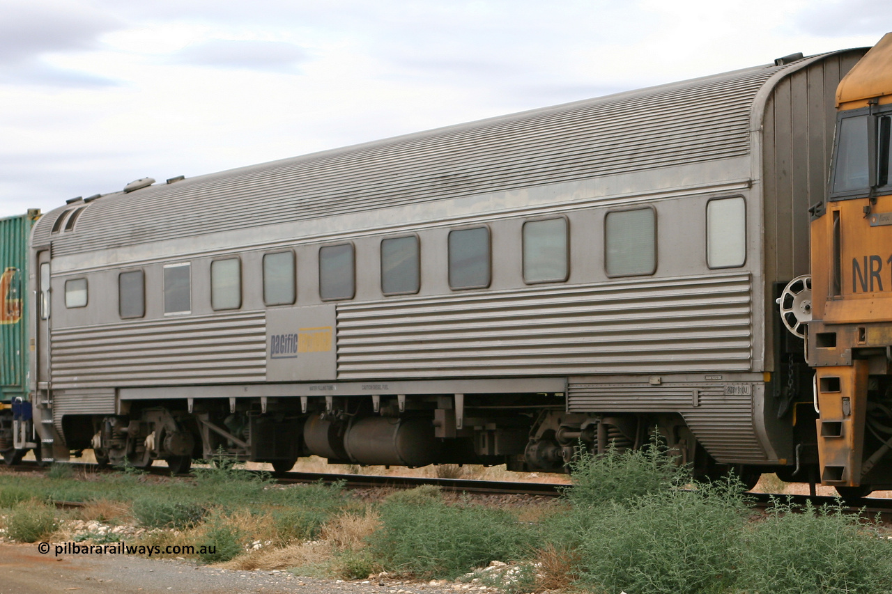060529 4726
Parkeston, Pacific National RZBY type crew accommodation car RZBY 910 on train 6WP2, built by Comeng NSW as ER type stainless steel air conditioned crew dormitory car ER 210 in 1969, renumbered to ER 911 in 1974, sold to National Rail and converted to crew car in 1997.
Keywords: RZBY-type;RZBY910;Comeng-NSW;ER-type;ER210;ER910;