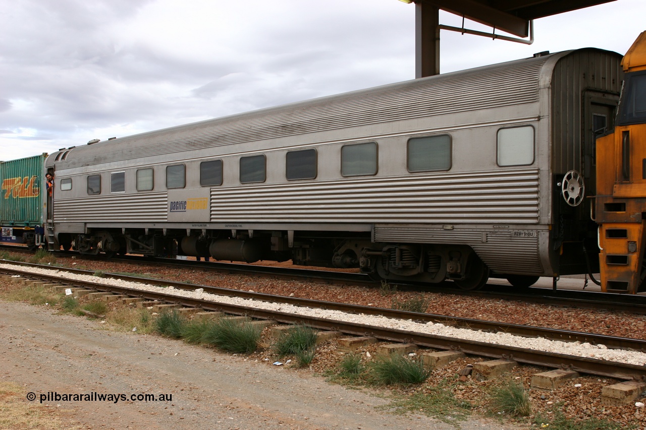 060529 4731
Parkeston, Pacific National RZBY type crew accommodation car RZBY 910 on train 6WP2, built by Comeng NSW as ER type stainless steel air conditioned crew dormitory car ER 210 in 1969, renumbered to ER 911 in 1974, sold to National Rail and converted to crew car in 1997.
Keywords: RZBY-type;RZBY910;Comeng-NSW;ER-type;ER210;ER910;