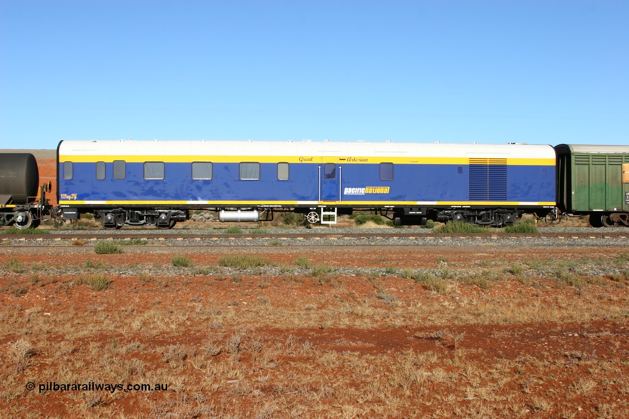 060530 4844
Parkeston, SCT VPAY type crew accommodation car VPAY 2 'Great Artesian' on train 2PM9, built by Tulloch Ltd NSW in 1968 as a narrow gauge brake van with sleeping accommodation as NHRD type NHRD 79, converted to standard gauge in 1981 and coded HRD type HRD 361. Recoded to AVDY in October 1982, then to AVDP. Sold to WCR, then in October 2000 overhauled for crew car use and coded VPAY 1 on SCT services and owned by Freight Australia. Was later sold to Pacific National and subsequently scrapped 2016.
Keywords: VPAY-type;VPAY2;Tulloch-Ltd-NSW;NHRD-type;NHRD79;HRD-type;HRD361;AVDY-type;AVDP-type;