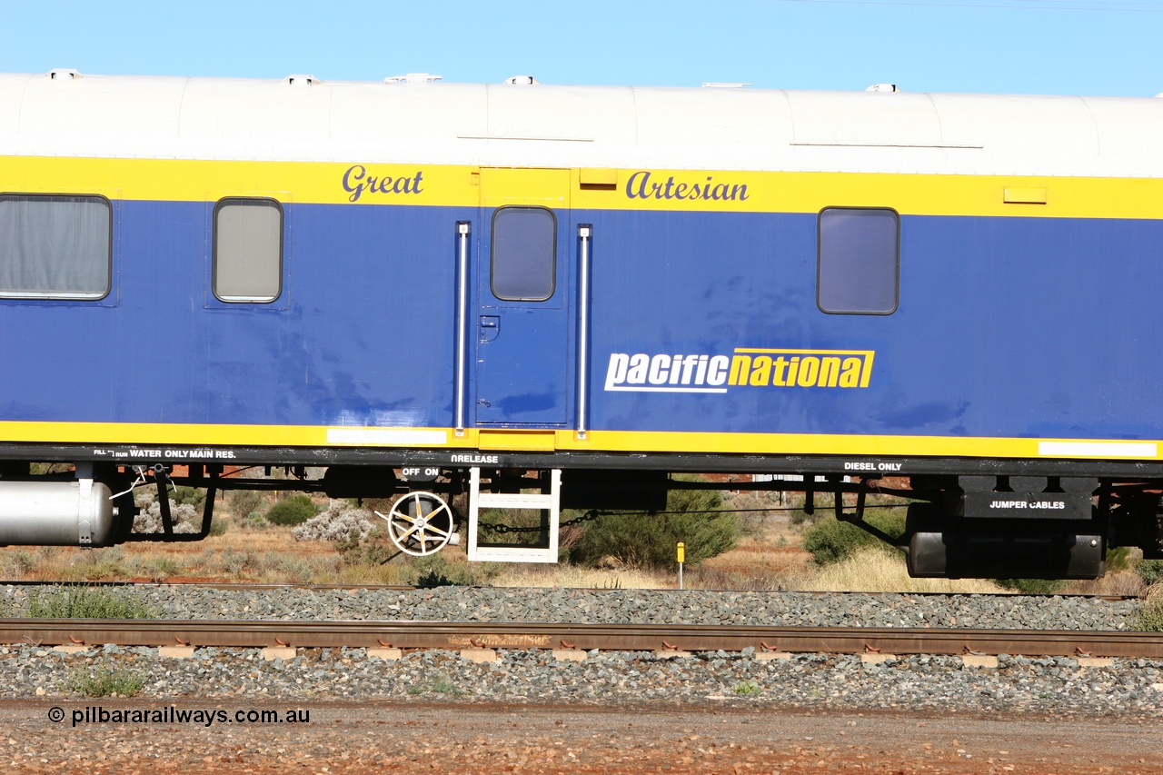 060530 4845
Parkeston, SCT VPAY type crew accommodation car VPAY 2 'Great Artesian' on train 2PM9, built by Tulloch Ltd NSW in 1968 as a narrow gauge brake van with sleeping accommodation as NHRD type NHRD 79, converted to standard gauge in 1981 and coded HRD type HRD 361. Recoded to AVDY in October 1982, then to AVDP. Sold to WCR, then in October 2000 overhauled for crew car use and coded VPAY 1 on SCT services and owned by Freight Australia. Was later sold to Pacific National and subsequently scrapped 2016.
Keywords: VPAY-type;VPAY2;Tulloch-Ltd-NSW;NHRD-type;NHRD79;HRD-type;HRD361;AVDY-type;AVDP-type;