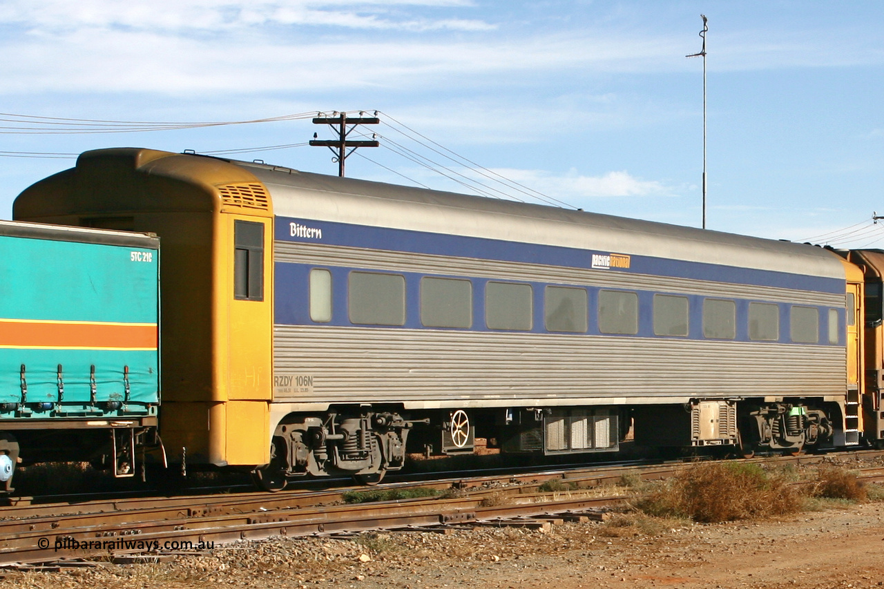 070527 9168
Parkeston; Pacific National RZDY type crew accommodation car RZDY 106 'Bittern' on train 6MP4 originally built by SAR Islington Workshops as a Bluebird railcar driving trailer in 1958 named 'Britten', in 1986 numbered 106, in 1990 converted to locomotive hauled and coded as BR type BR 106, written off in 1995 and sold off. In 1998 it was numbered 812. It was owned by a number of owners and then CFCLA. In 2006 converted to a Pacific National crew car.
Keywords: RZDY-type;RZDY106;SAR-Islington-WS;Bluebird;106;BR106;812;