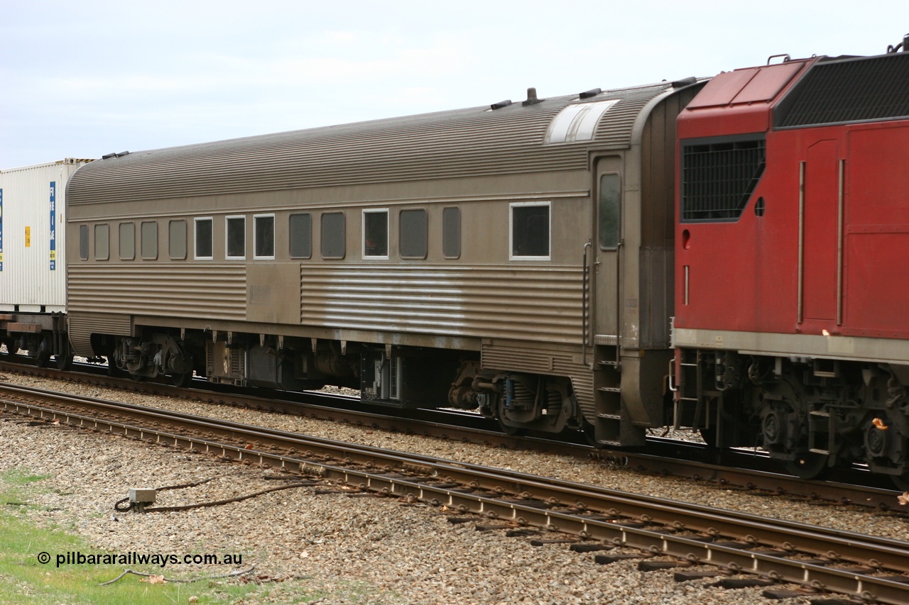 070607 10040
Midland, Pacific National RZBY type crew accommodation car RZBY 911 on train 2SP5, built by Comeng NSW as ER type stainless steel air conditioned crew dormitory car ER 211 in 1969, renumbered to ER 911 in 1974, sold to National Rail and converted to crew car in 1997.
Keywords: RZBY-type;RZBY911;Comeng-NSW;ER-type;ER211;ER911;