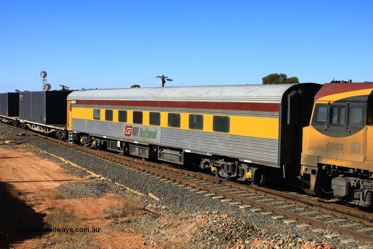 100602 8609
West Kalgoorlie, crew accommodation coach QCAY 5 was built by the South Australian Railways Islington Workshops in 1958 as Juki for The Overland as a corten steel roomette sleeping car. Sold to Blue Bird Rail in 1997, then to Grand Corporate Rail, renamed BMC 2, in 2003 sold to Great Southern Railway and renamed Sir John Forrest. Purchased by Bluebird Rail and converted to crew car and then sold to Queensland Rail.
Keywords: QCAY-type;QCAY5;SAR-Islington-WS;Juki;JRA-type;JRA5;