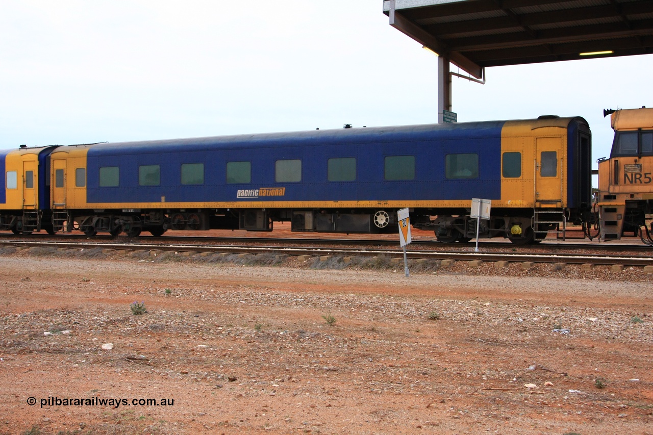100605 9067
Parkeston, Pacific National BRS type crew accommodation coach BRS 225, originally built by Victorian Railways Newport Workshops in November 1937 as a rivetted second class sitting car for the Spirit of Progress, in August 1939 coded to BS type BS 4, in July 1977 converted to a mini buffet and coded MRS 1 and then in October 1983 recoded to BRS 225. Painted in V/Line livery in 1992. Ended up with West Coast Railway in the late 1990s, painted in WCR livery Sept 2001, prior to Pacific National ownership and conversion to a crew car.
Keywords: BRS-type;BRS225;Victorian-Railways-Newport-WS;BS-type;BS4;MRS-type;MRS1;