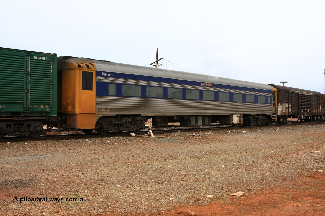 100605 9083
Parkeston; Pacific National RZDY type crew accommodation car RZDY 106 'Bittern' originally built by SAR Islington Workshops as a Bluebird railcar driving trailer in 1958 named 'Britten', in 1986 numbered 106, in 1990 converted to locomotive hauled and coded as BR type BR 106, written off in 1995 and sold off. In 1998 it was numbered 812. It was owned by a number of owners and then CFCLA. In 2006 converted to a Pacific National crew car.
Keywords: RZDY-type;RZDY106;SAR-Islington-WS;Bluebird;106;BR106;812;