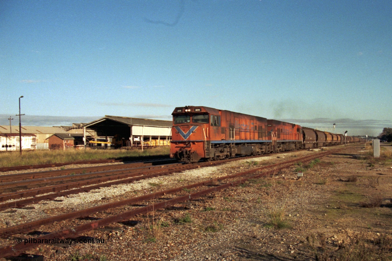 186-10
Midland, empty narrow gauge grain train 283 rumbles past Midland Workshops behind a pair of Westrail P class locomotives P 2011 'Shire of Narembeen' Goninan GE model CM25-8 serial 6320-09/90-096 and P 2006 'Shire of Quairading' serial 6320-05/90-091.
Keywords: P-class;P2011;Goninan-WA;GE;CM25-8;90-096;
