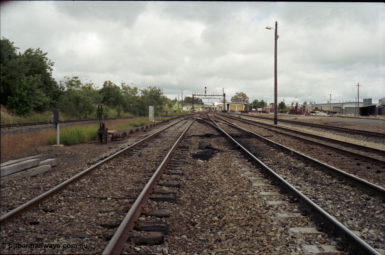 188-13
Wagga Wagga, located 521 km from Sydney on the NSW Main South, looking south from Frame C on the Tumbarumba branch line with the goods shed with yellow doors in the distance, the track at far left is the Loco Siding. Geo [url=https://goo.gl/maps/UvQTy2UvaU92]Data[/url].
