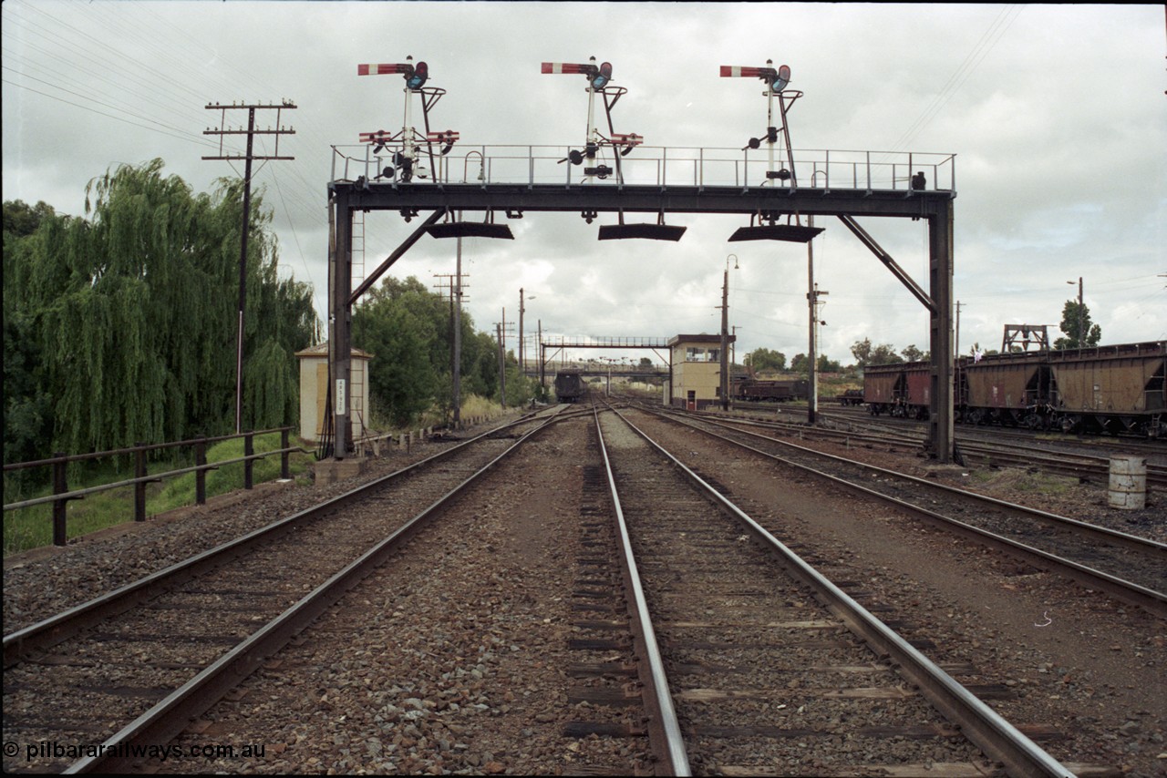 188-24
Junee, NSW Main South looking towards Albury along the middle road which becomes the mainline, the Down Shunting Neck is on the left, the signal bridge is at the 485.920 km.
