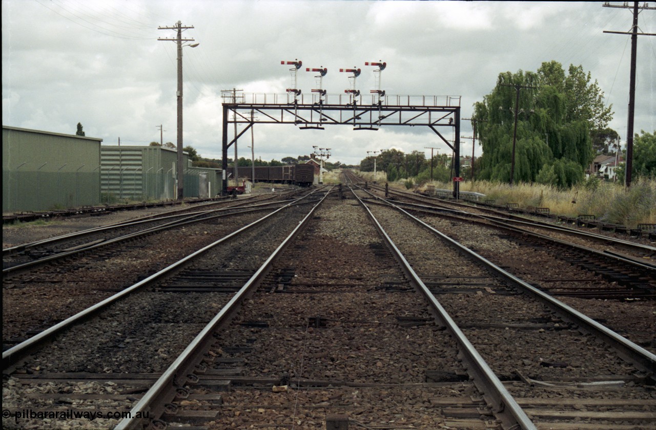 188-28
Junee, NSW Main South, looking north with the mainlines to Sydney running straight ahead and the former line to Hay and Old Junee curving away to the left.
