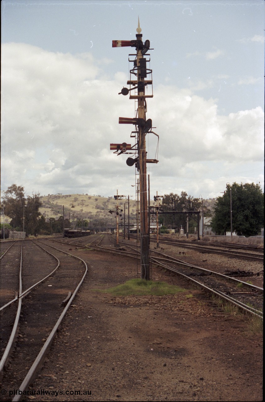 190-11
Cootamundra, NSW Main South, looking south, with the Sorting Sidings at left, and main yard in the middle, mainlines at right with the Down Refuge running down the middle of image.

