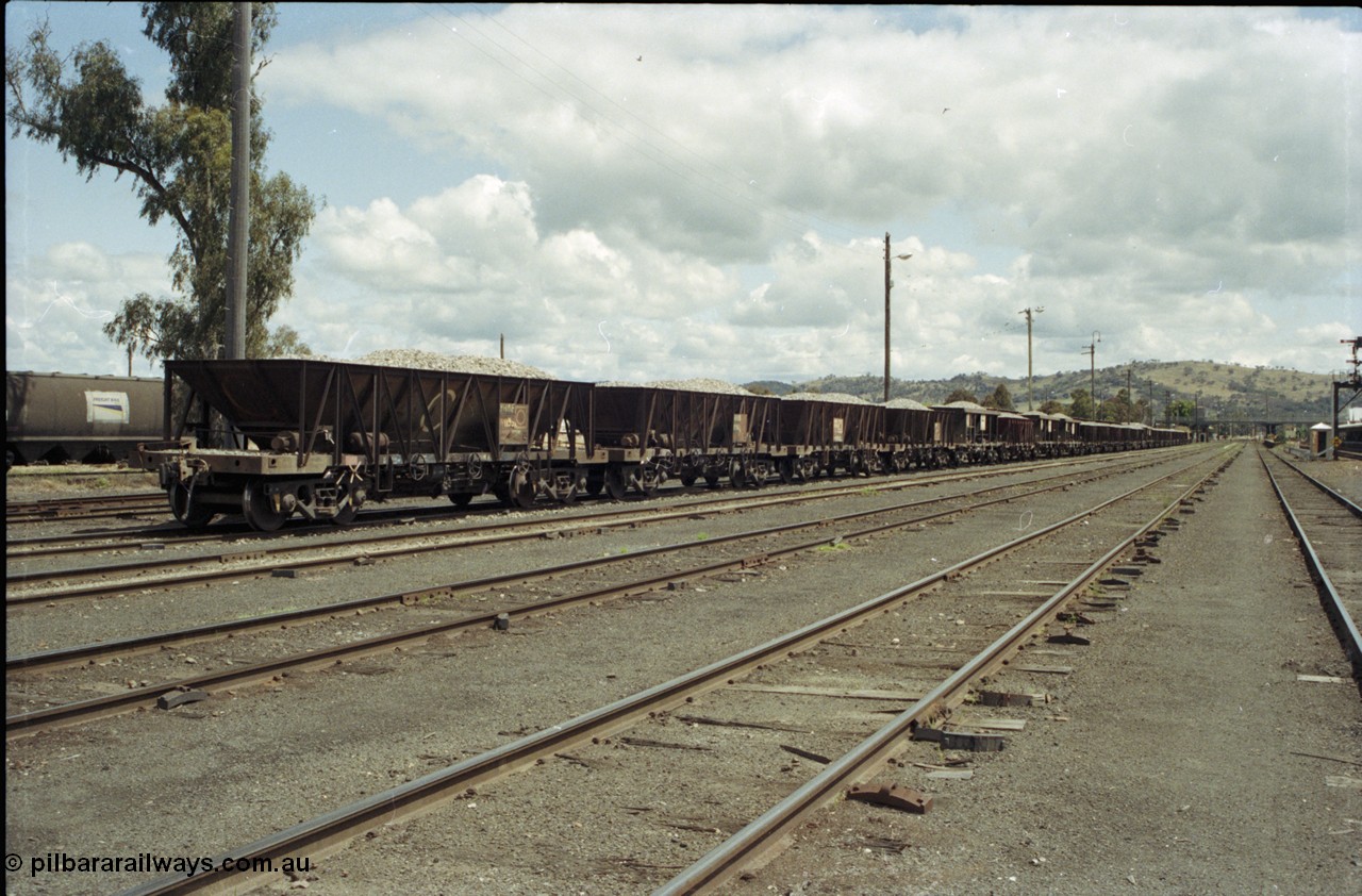 190-14
Cootamundra, NSW Main South, a loaded rake of ballast hoppers.

