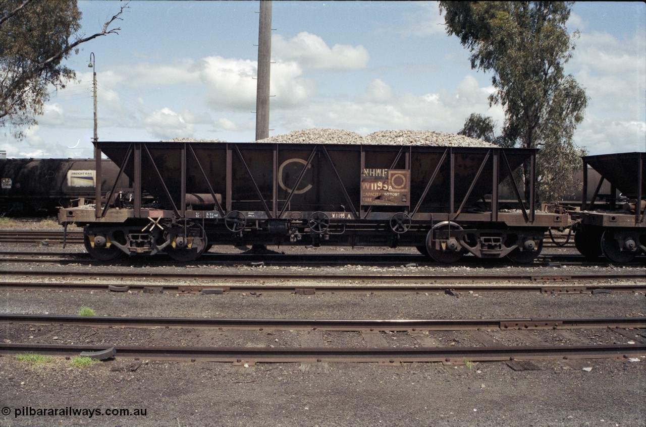 190-15
Cootamundra, NSW Main South, departmental waggon W 1195, a loaded NHWF type bogie ballast waggon NHWF 1195.
Keywords: NHWF-type;NHWF1195;W1195;