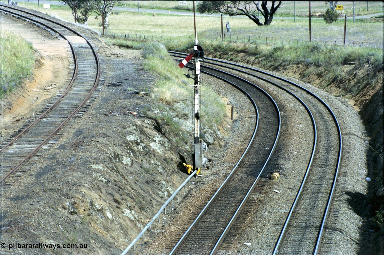 190-21
Demondrille, NSW Main South, a signal for Up trains running through to Goulburn, looking north from Wombat Road, the North Shunting Neck is on the left.
