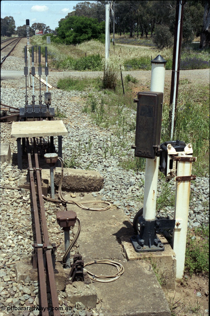 190-32
Marinna, located at the 477.88 km on the NSW Main South line, looking south from south end with grain siding and mainline crossover operating ground frame and interlocking infrastructure.
