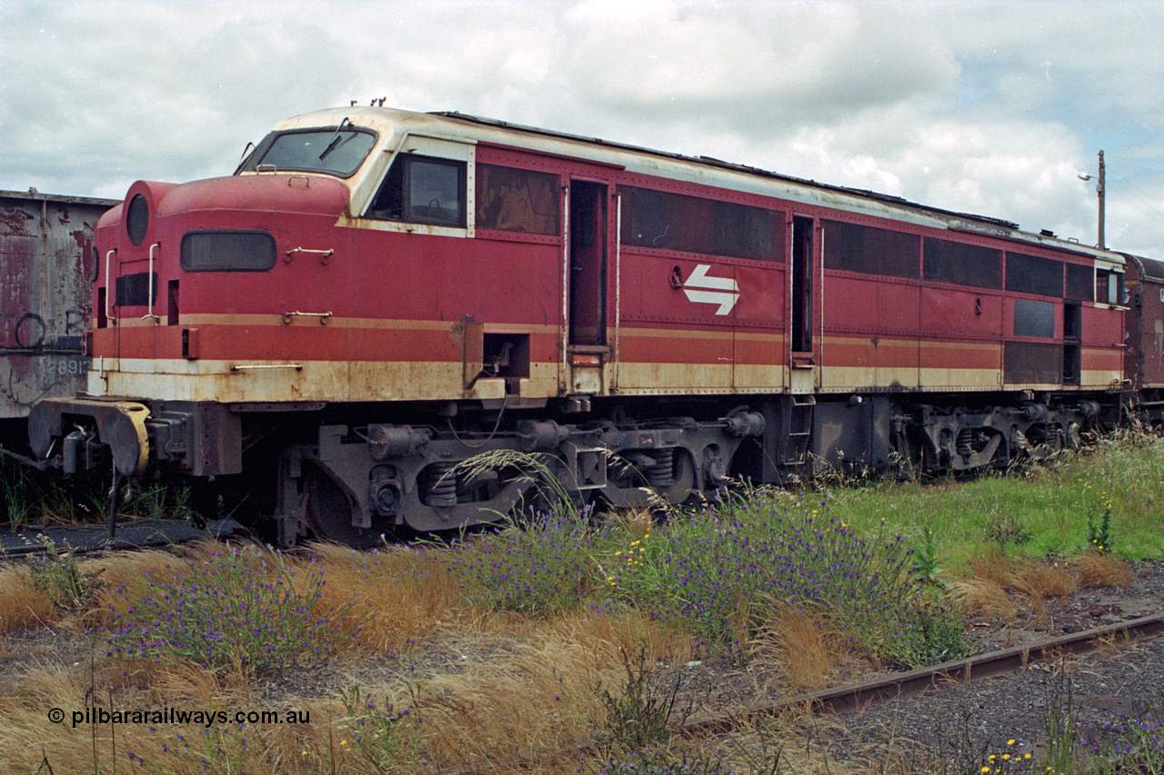 192-15
Junee, NSWSRA standard gauge locomotive depot, a forlorn unidentified 44 class in the NSWSRA candy livery built by AE Goodwin as an ALCo DL500B.
Keywords: 44-class;AE-Goodwin;ALCo;DL500B;