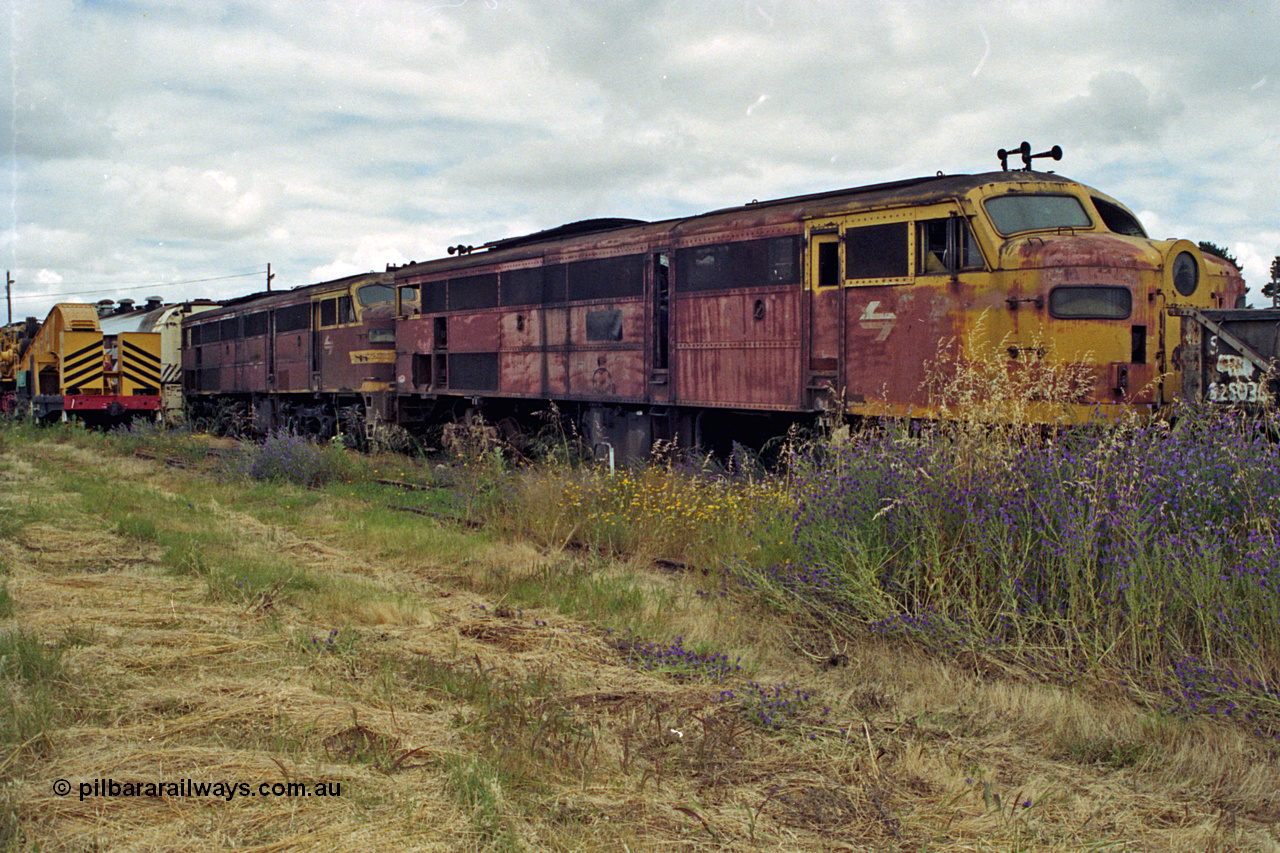 192-19
Junee, NSWSRA standard gauge locomotive depot, a pair of stored ALCo model DL-500B units in very poor condition.
Keywords: 44-class;AE-Goodwin;ALCo;DL500B;