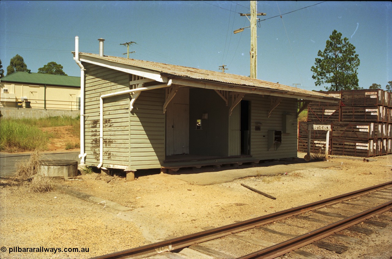 193-00
Wamuran station building from the eastern end. The line through Wamuran opened on December 6, 1909 and was extended to Kilcoy by 1914, then Wamuran became the terminus on the July 1, 1964 This station building now resides at the Australian Narrow Gauge Railway Museum Society in Woodford.
