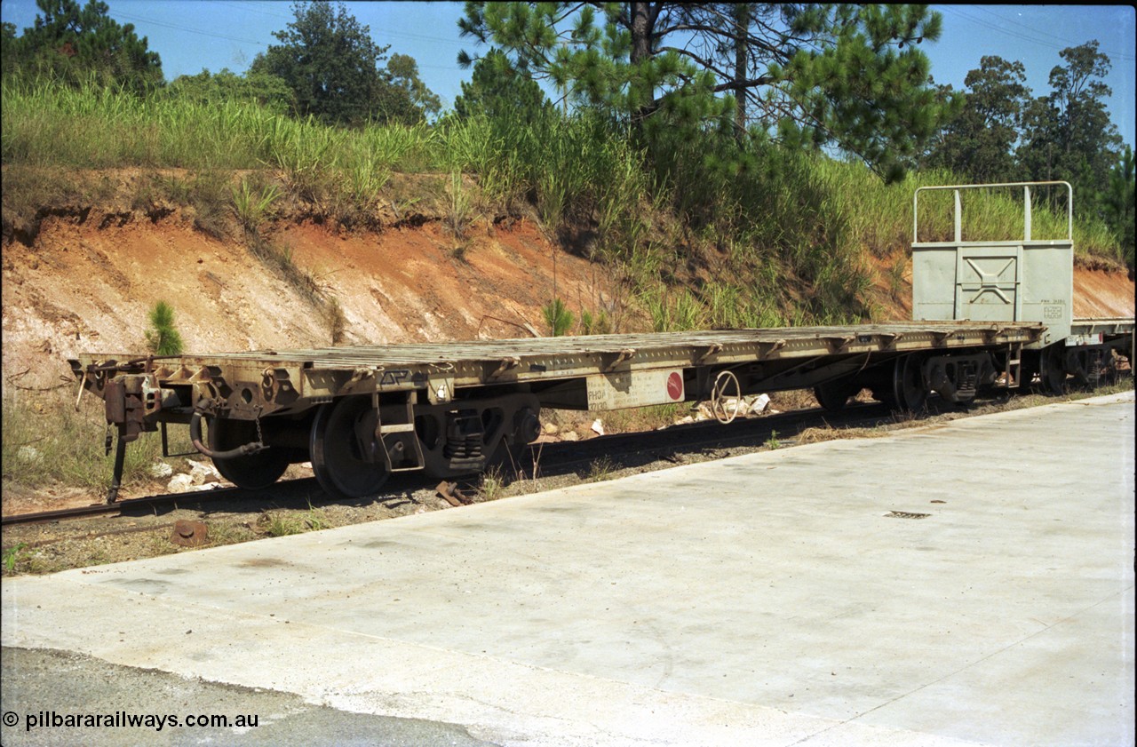 193-01
Wamuran, PHOA type flat waggon PHOA 37130 awaits loading on the goods loop, originally a HO type open waggon built by Comeng Qld, one of 100 such waggons in 1973-74. Behind it is a cut down WHX type former grain waggon built by Comeng Qld in 1959-60, one of 300 built, now coded PWH type PWH 31350.
Keywords: PHOA-type;PHOA37130;Comeng-Qld;HO-type;WHX-type;PWH-type;PWH31350;