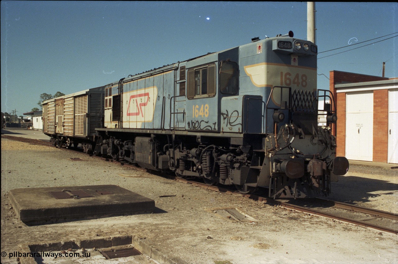 193-19
Gympie, station yard, QR narrow gauge unit 1648, an English Electric RS95C model built at their Rocklea Qld plant in 1967, known in the QR as class 1620. [url=https://goo.gl/maps/Yav8VtdvkZD2]GeoData[/url].
Keywords: 1620-class;1648;English-Electric;RS95C;A-190;