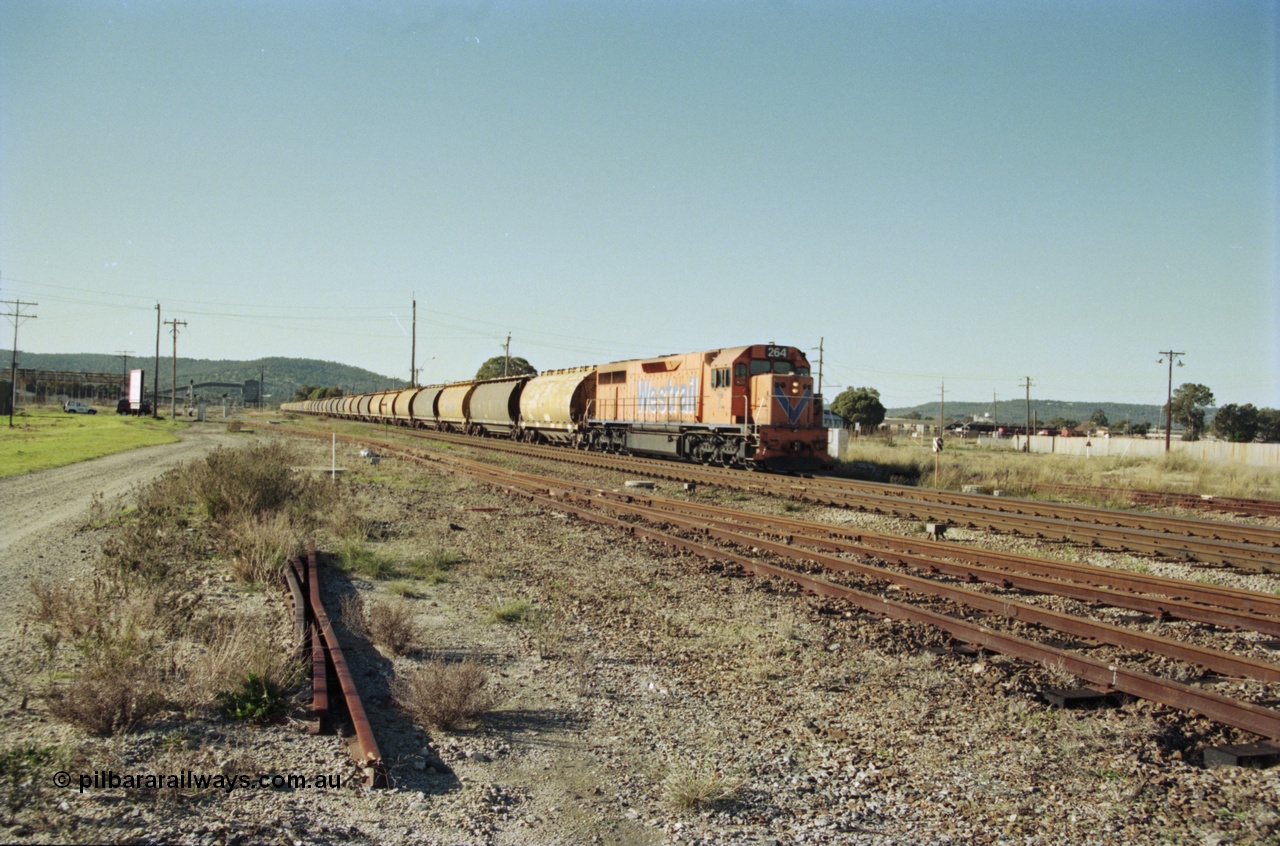 200-32
Midland, loaded standard gauge grain train behind Westrail L class L 264 Clyde Engineering EMD model GT26C serial 68-554 crossing Lloyd Street grade crossing 0940 hrs 24th June 1997.
Keywords: L-class;L264;Clyde-Engineering-Granville-NSW;EMD;GT26C;68-554;