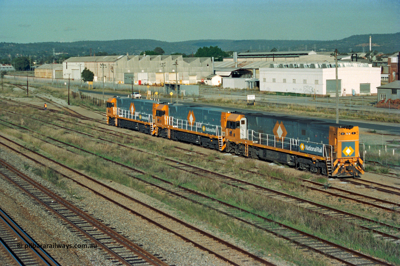 201-04
Midland, the first Perth built NR class NR 61 Goninan GE model Cv40-9i serial 7250-11/96-263 shunts at Midland with two brand new NR units.
Keywords: NR-class;NR61;Goninan;GE;CV40-9i;7250-11/96-263;