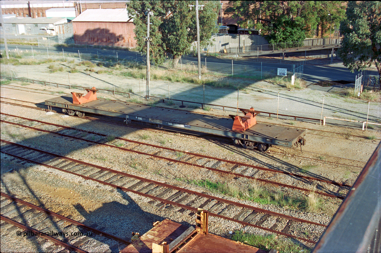 201-07
Midland, elevated view from the Workshops Footbridge, RQRX type waggon RQRX 60177 a 53 tonne capacity flat waggon, originally built by Comeng NSW in 1971 as part of a batch of fifty CBX type waggons, later converted from NQBX type NQBX 21782.
Keywords: RQRX-type;RQRX60177;Comeng-NSW;CBX-type;CBX21782;