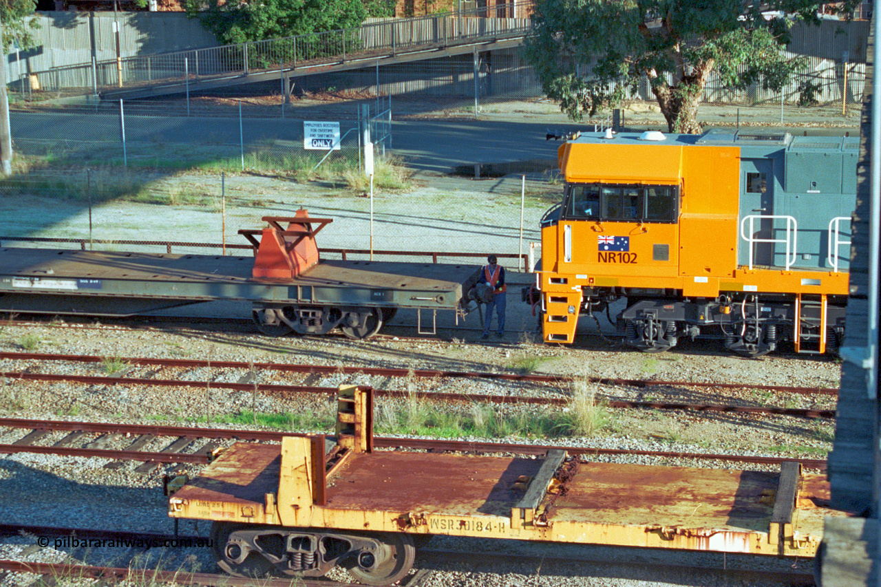 201-21
Midland, Goninan WA built GE Cv40-9i model NR class unit NR 102 serial 7250-07/97-302 shunts on RQRX type waggon RQRX 60177, with a WSR type rail distribution waggon in the foreground.
Keywords: NR-class;NR102;Goninan;GE;CV40-9i;7250-07/97-302;