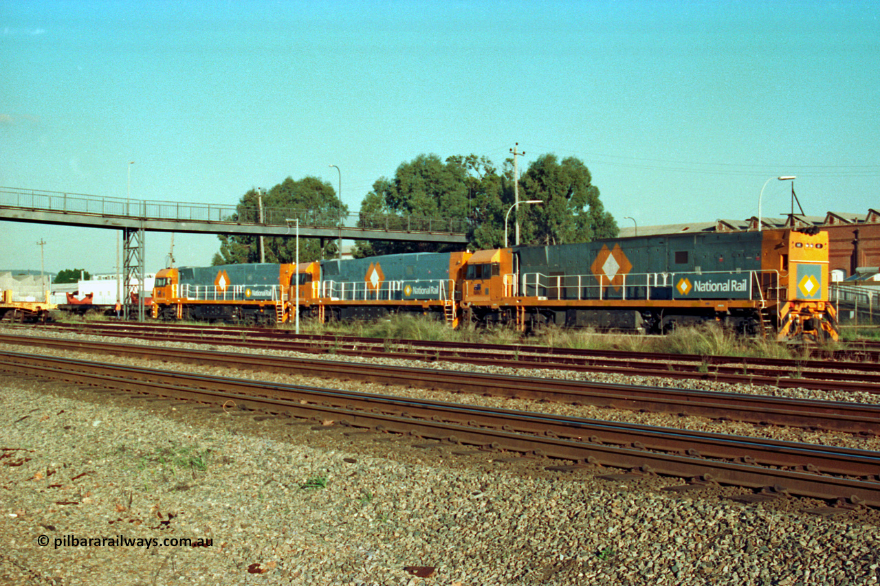 201-22
Midland, the first Perth built NR class NR 61 Goninan GE model Cv40-9i serial 7250-11/96-263 shunts at Midland with two brand new NR units NR 101 and NR 102 with waggon RQRX 60177.
Keywords: NR-class;NR61;Goninan;GE;CV40-9i;7250-11/96-263;