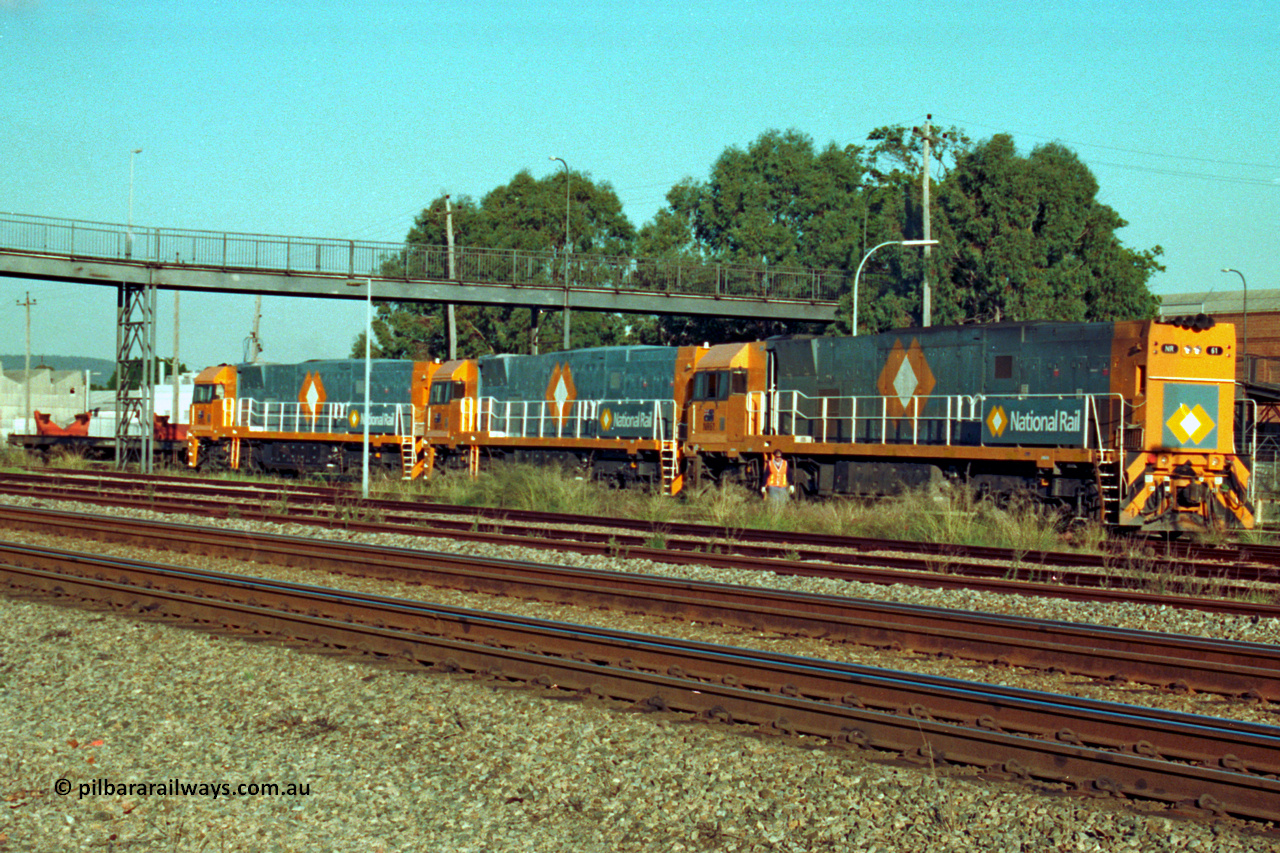201-24
Midland, the first Perth built NR class NR 61 Goninan GE model Cv40-9i serial 7250-11/96-263 shunts at Midland with two brand new NR units NR 101 and NR 102 with waggon RQRX 60177.
Keywords: NR-class;NR61;Goninan;GE;CV40-9i;7250-11/96-263;