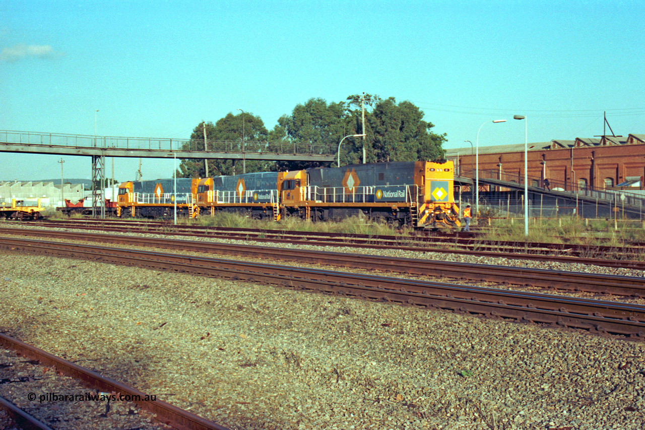201-26
Midland, the first Perth built NR class NR 61 Goninan GE model Cv40-9i serial 7250-11/96-263 shunts at Midland with two brand new NR units NR 101 and NR 102 with waggon RQRX 60177.
Keywords: NR-class;NR61;Goninan;GE;CV40-9i;7250-11/96-263;