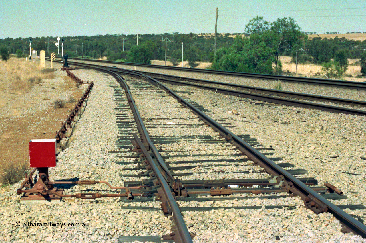 202-25
Meckering, view looking east with the east end catch points and dwarf indicator for the goods loop and rodding heading towards the interlocked ground frame where it re-joins the crossing loop.
