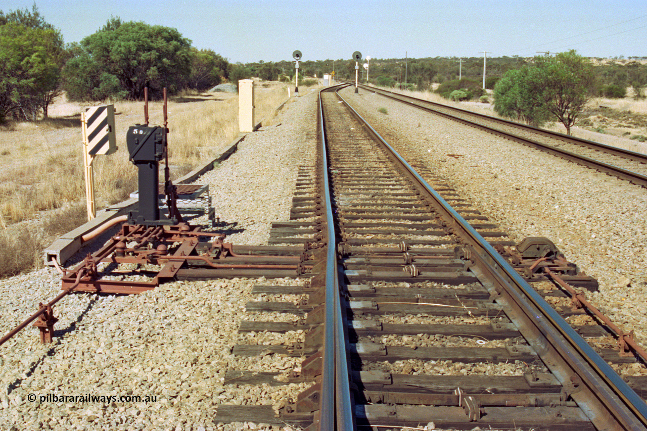 202-28
Meckering, looking east at the interlocking levers #1 and #2 and Pilot Key box 5B for the goods siding and derail at the east end of the crossing loop.
