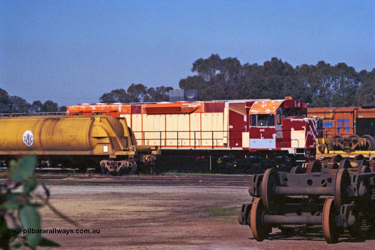 208-2-29
Midland Workshops, Westrail L class L 255 a Clyde Engineering EMD model GT26C, serial 67-545 under overhaul surrounded by various rollingstock including the WSL 30650 bogie transport waggon which was built for this task in 1977 at Midland Workshops.
Keywords: L-class;L255;Clyde-Engineering-Granville-NSW;EMD;GT26C;67-545;WSL-type;WSL30650;