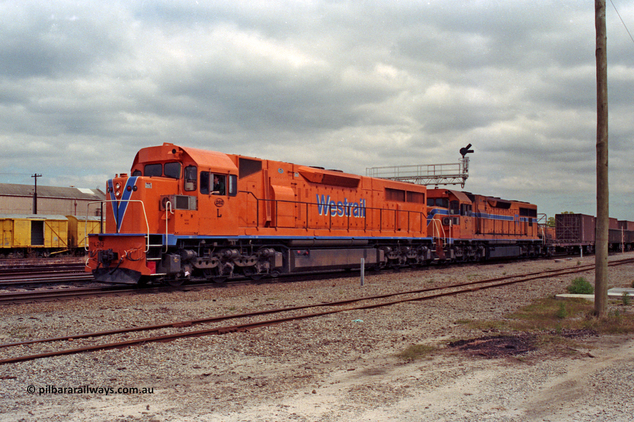 209-22
Midland, the midday east bound freighter waits for line clear behind Westrail's Clyde Engineering built EMD GT26C model L class units L 262 serial 68-552 and L 269.
Keywords: L-class;L262;Clyde-Engineering-Granville-NSW;EMD;GT26C;68-552;
