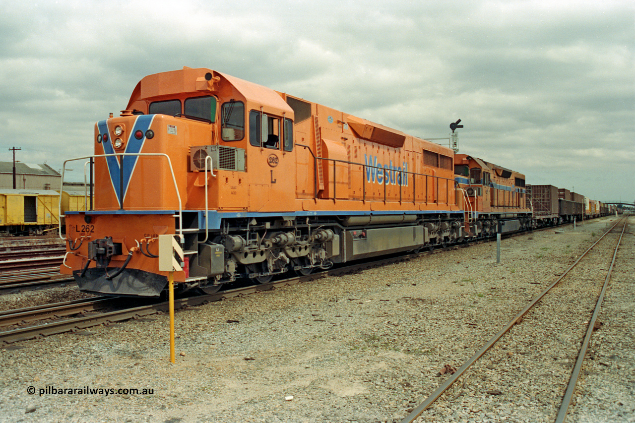 209-24
Midland, the midday east bound freighter waits for line clear behind Westrail's Clyde Engineering built EMD GT26C model L class units L 262 serial 68-552 and L 269.
Keywords: L-class;L262;Clyde-Engineering-Granville-NSW;EMD;GT26C;68-552;