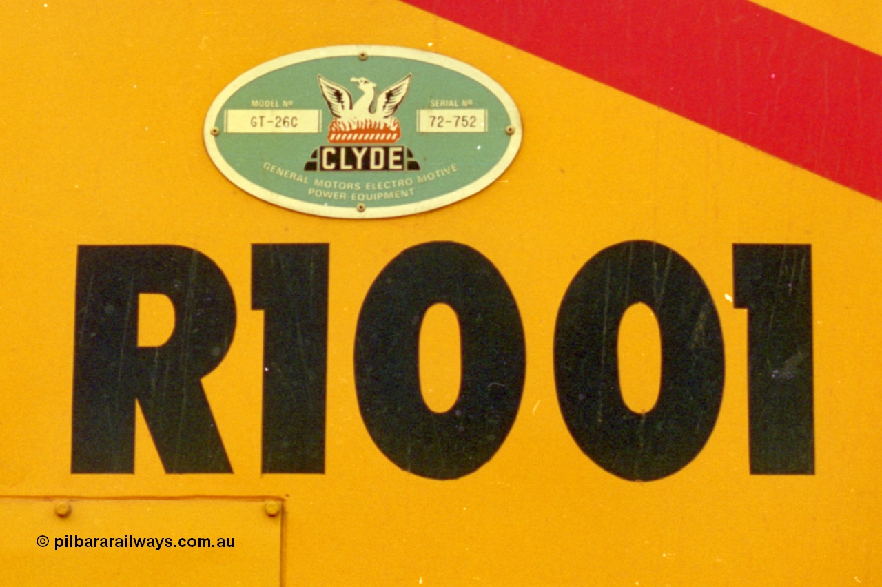 210-06
Weipa, Lorim Point, cab side view of loco number and builders plate for Clyde Engineering EMD model GT26C serial 72-752 for Comalco numbered R 1001, originally numbered at 1.001.
Keywords: R1001;Clyde-Engineering;EMD;GT26C;72-752;1.001;Comalco;