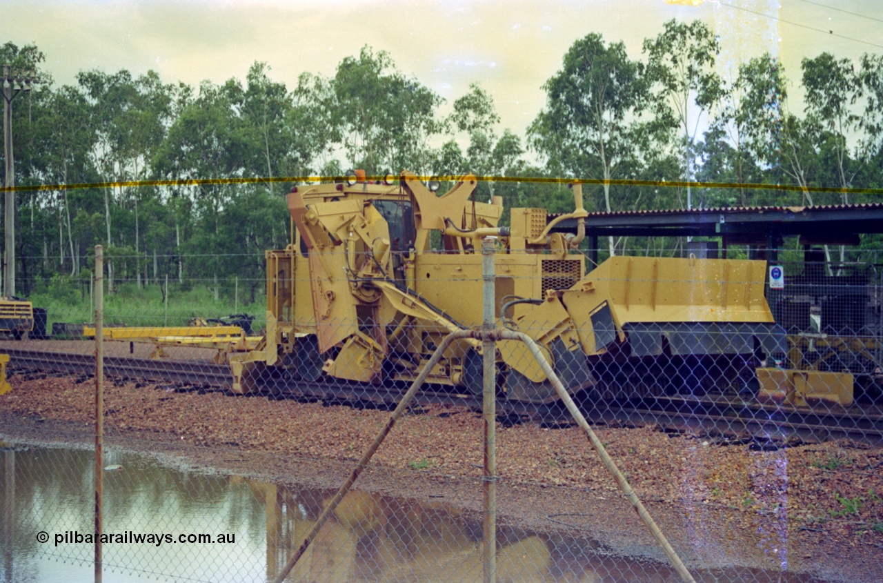 210-16
Weipa, Lorim Point track maintenance compound, Aresco ballast regulator, rear view.
Keywords: Aresco;track-machine;Comalco;