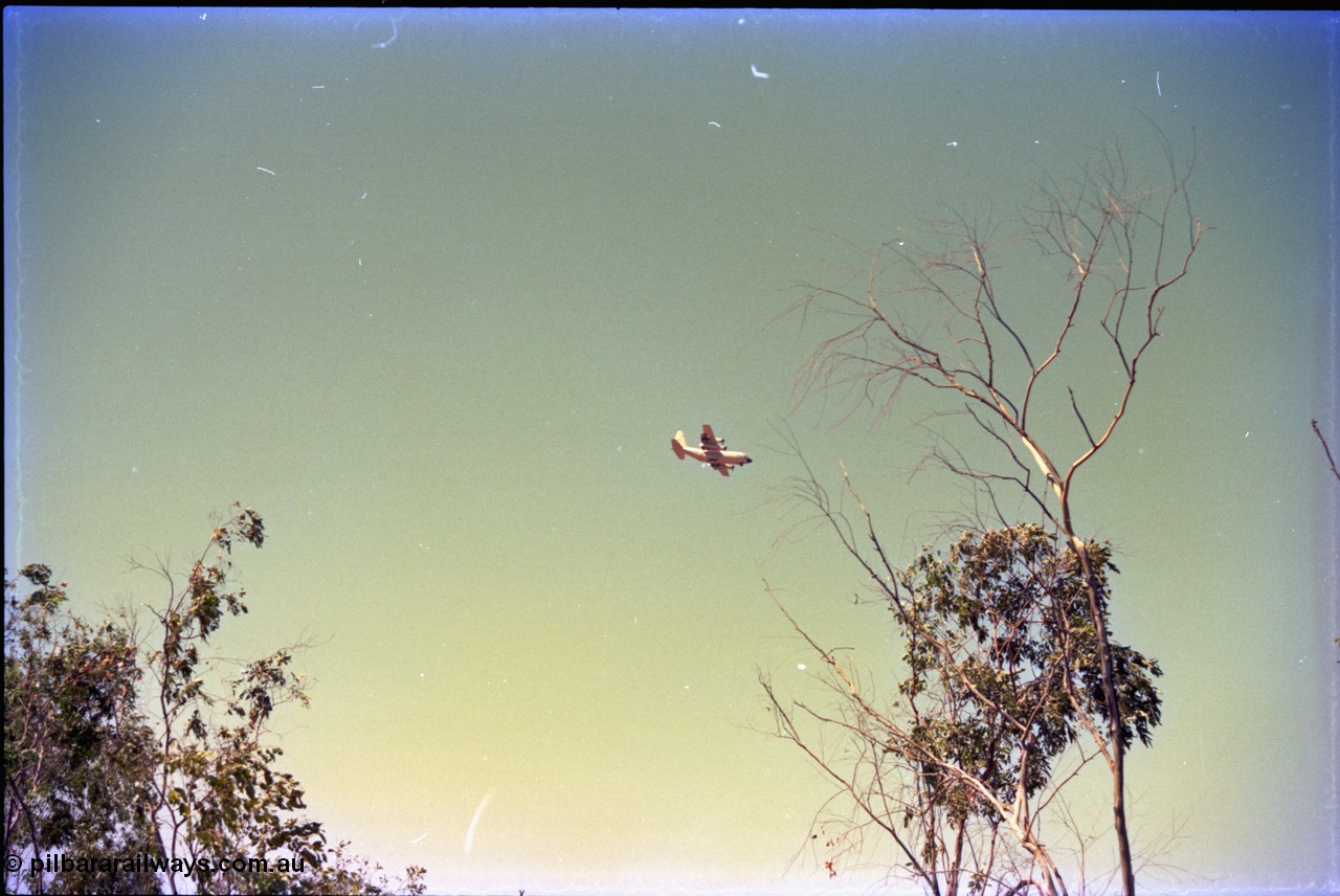 212-05
Weipa, RAAF Hercules plane preparing for landing at Scherger Base.
