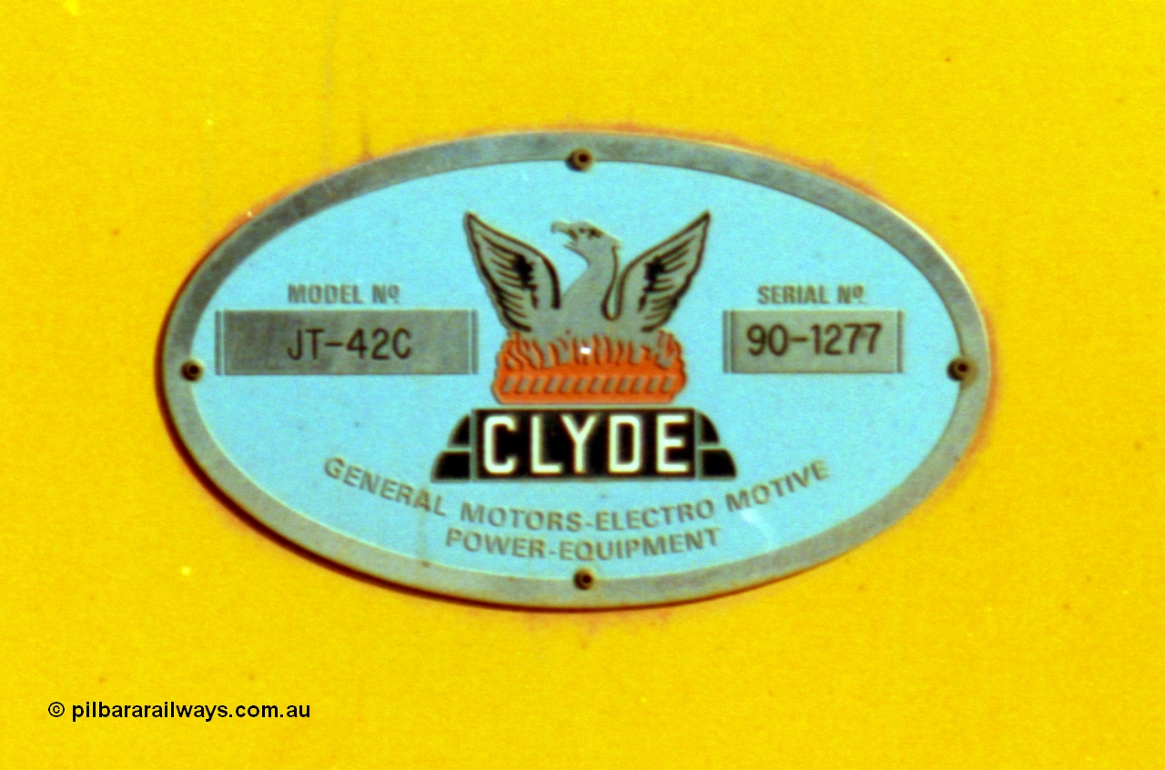 213-27
Weipa, builders plate on Comalco R 1004. Purchased from BHP Iron Ore in 1994. Clyde Engineering built EMD model JT42C built 1990 serial 90-1277, weight 132 tonne, engine 12-710G3A, generator AR11-WBA-CA5, traction motors D87ETR, rated power /.
Keywords: R1004;Clyde-Engineering-Kelso-NSW;EMD;JT26C;90-1277;Comalco;GML10;Cinderella;GML-class;