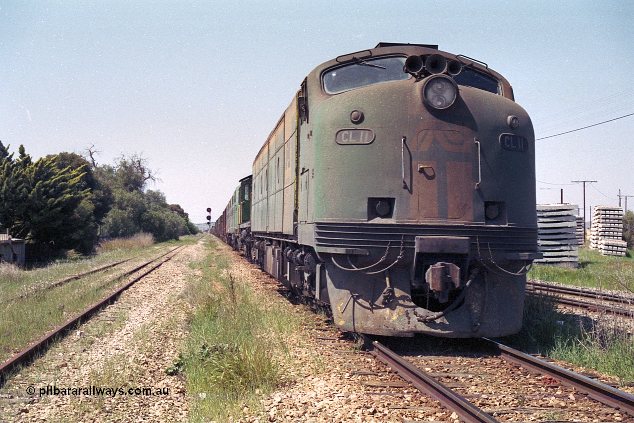 215-07
Peterborough, an SP service awaits line clear behind the AN liveried quad combination of Clyde Engineering EMD model AT26C CL class Bulldog CL 11 serial 71-739 which in later life became CLF 2, ALCo model DL541 600 class 605 serial G6015/04 which went on to become BU 1, and EMD model A16C GM class Bulldogs units GM 43 serial 67-529 and GM 46 serial 67-532.
Keywords: CL-class;600-class;GM-class;CL11;605;GM43;GM46;bulldog;AT26C;DL541;71-739;G6015-4;AE-Goodwin;ALCo;EMD;Clyde-Engineering-Granville-NSW;A16C;67-529;67-532;