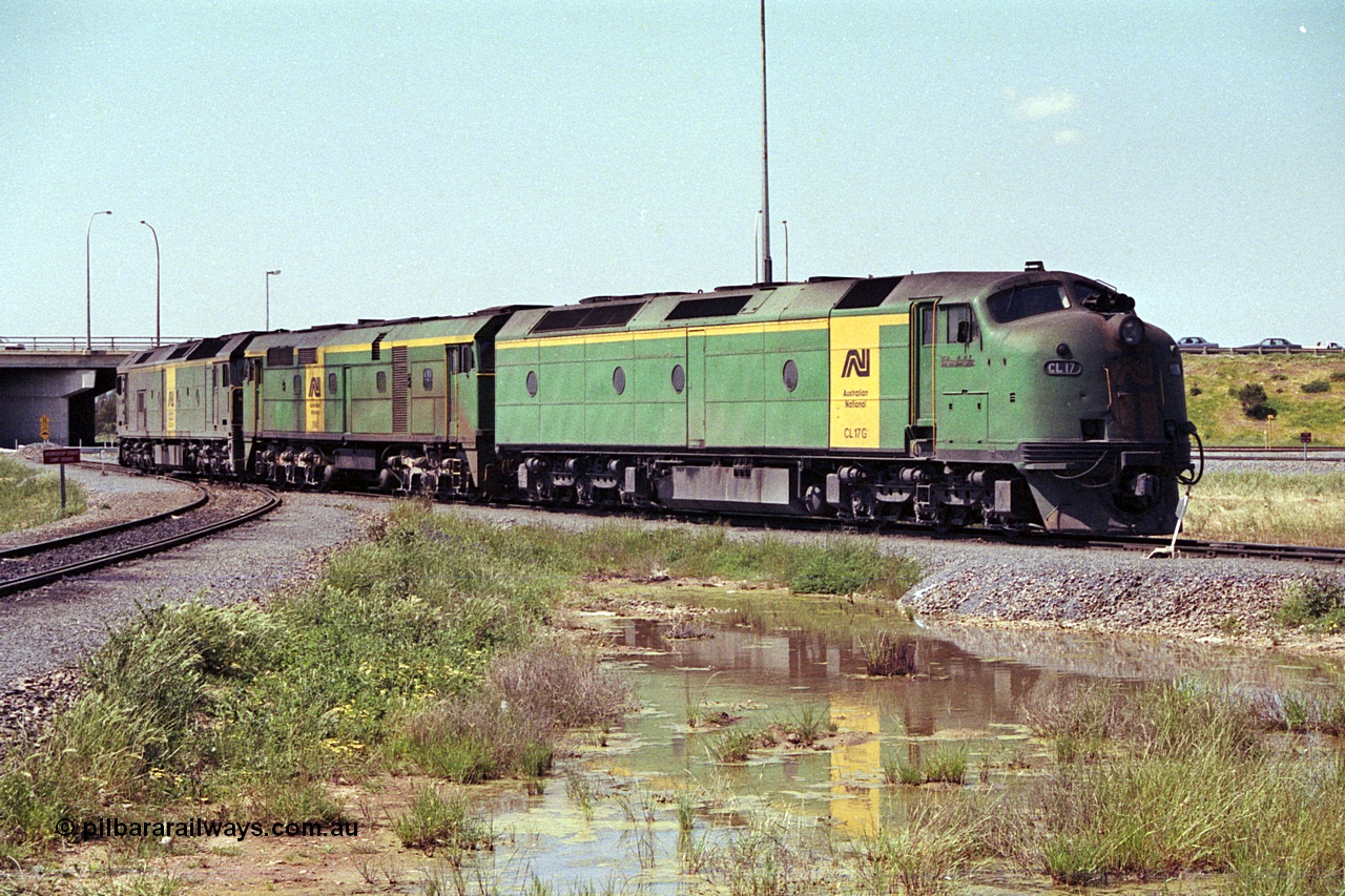 215-16
Dry Creek Motive Power Centre, Australian National trio of standard gauge light engines wearing the AN livery with the final Clyde Engineering EMD model AT26C Bulldog ever built CL class CL 17 'William McMahon' serial 71-757 leading an ALCo 700 class and a Clyde Engineering EMD BL class.
Keywords: CL-class;CL17;Clyde-Engineering-Granville-NSW;EMD;AT26C;71-757;bulldog;