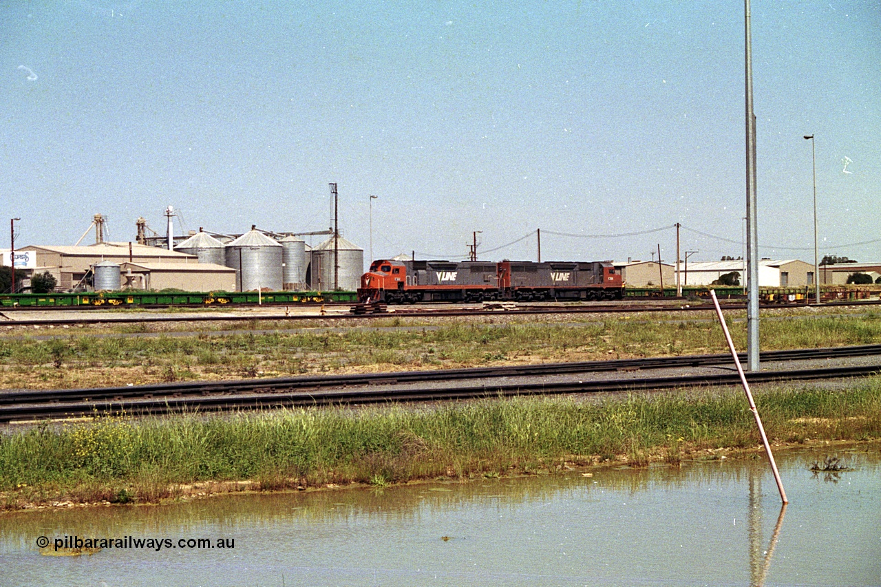 215-17
Dry Creek Yard, a pair of broad gauge V/Line C class locomotives rest between jobs.
