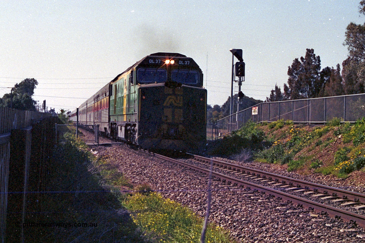215-33
Dudley Park, the south bound Ghan rolls past on the way to Keswick Terminal behind AN livered DL class DL 37 Clyde Engineering EMD model AT42C serial 88-1245.
Keywords: DL-class;DL37;Clyde-Engineering-Kelso-NSW;EMD;AT42C;88-1245;