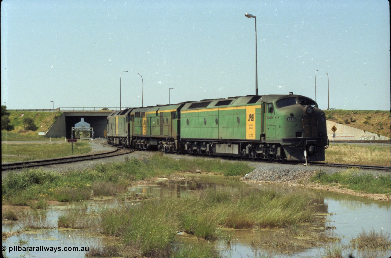 216-09
Dry Creek Motive Power Centre, Australian National trio of standard gauge light engines wearing the AN livery with CL class CL 17 'William McMahon' Clyde Engineering EMD model AT26C serial 71-757 leading a 700 class and a BL class.
Keywords: CL-class;CL17;Clyde-Engineering-Granville-NSW;EMD;AT26C;71-757;bulldog;