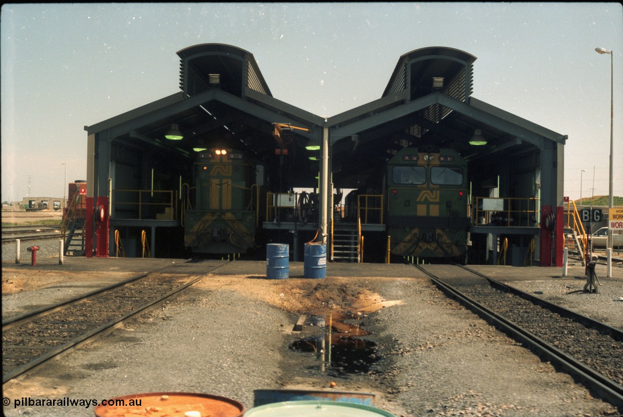 216-19
Dry Creek Motive Power Centre, fuel point shed, standard gauge road on the left with 600 class 606 AE Goodwin ALCo model DL541 serial G6015-5 and dual gauge road on the left with BL class BL 32 Clyde Engineering EMD model JT26C-2SS serial 83-1016.
Keywords: 600-class;606;AE-Goodwin;ALCo;DL541;G6015-5;