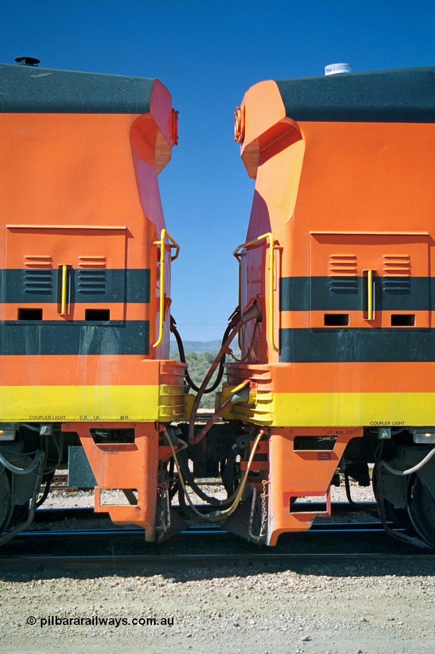 244-09
Port Augusta yard, blanked off cab to cab Morrison Knudsen rebuild units ALF 20 on the left and ALF 18 on the right, model JT26C-2M serials 94-AN-020 and 94-AN-018 in Australian Southern livery, originally AL class AL 24 and 21.
Keywords: ALF-class;ALF18;ALF20;MKA;EMD;JT26C-2M;94-AN-018;94-AN-020;rebuild;AL-class;Clyde-Engineering;EMD;JT26C;